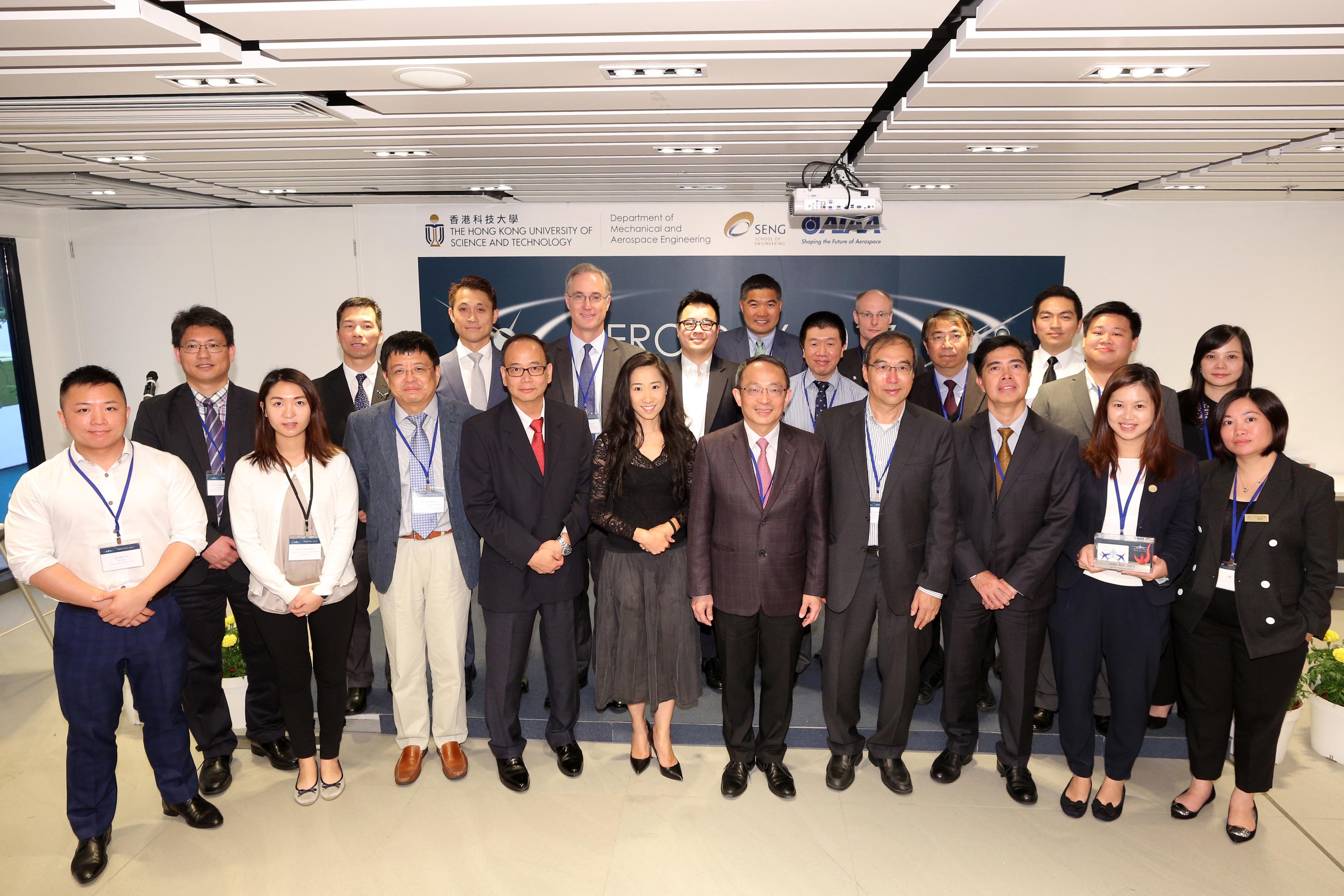 Representatives of participating companies and professional institutions in the aviation industry pose for a photo after souvenir presentation by Swire Professor of Aerospace Engineering Prof Xin Zhang (3rd from left, front row), Chair Professor of Mechanical and Aerospace Engineering, also with Ms Candy Nip (6th from right, front row), Principal Assistant Secretary for Transport and Housing (Transport), Prof Tim Kwang Ting Cheng (5th from right, front row), Dean of Engineering, and Prof Christopher Chao (1