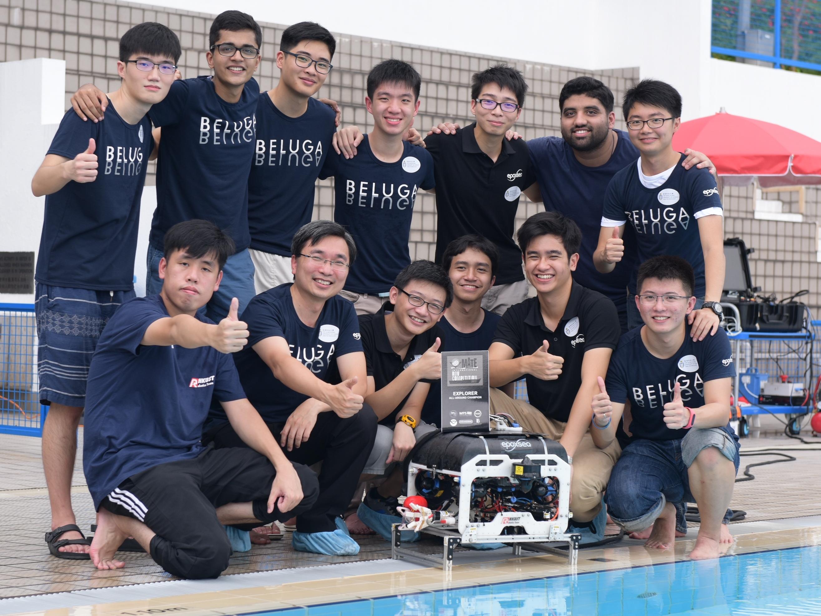 HKUST’s Robotics Team leader Prof Woo Kam Tim (second left, front row), his team members and their ROV Beluga.