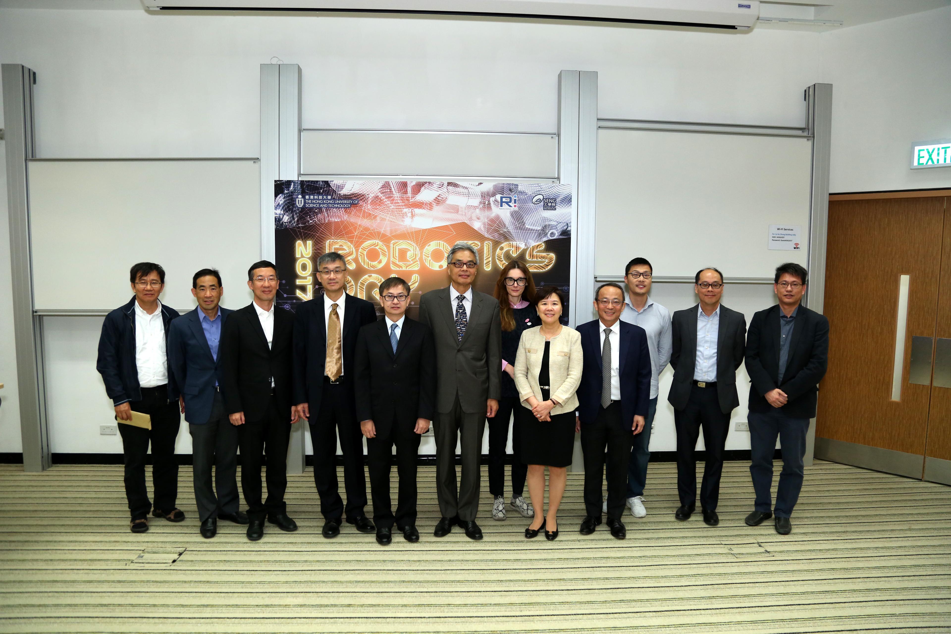 The organizers and speakers (from left) – (4th) Prof Michael Wang, Director of the HKUST Robotics Institute; (5th) Dr David Chung Wai-keung, Under Secretary for Innovation and Technology, HKSAR Government; (6th) Prof Wei Shyy, Executive Vice-President & Provost, HKUST; (8th) Prof Nancy Ip, Vice-President for Research and Graduate Studies, HKUST; and (9th) Prof Tim Cheng, Dean of Engineering, HKUST.