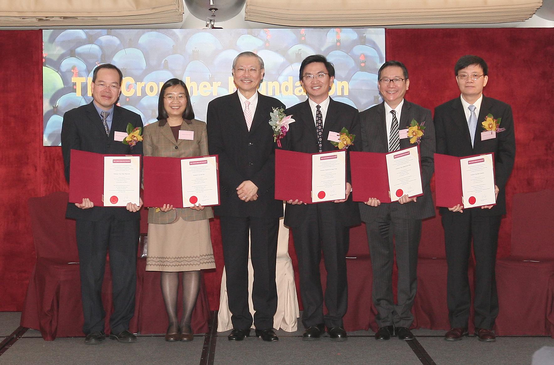  The Croucher Senior Research Fellowship recipients with Mr Michael Suen, Secretary for Education of the HKSARG