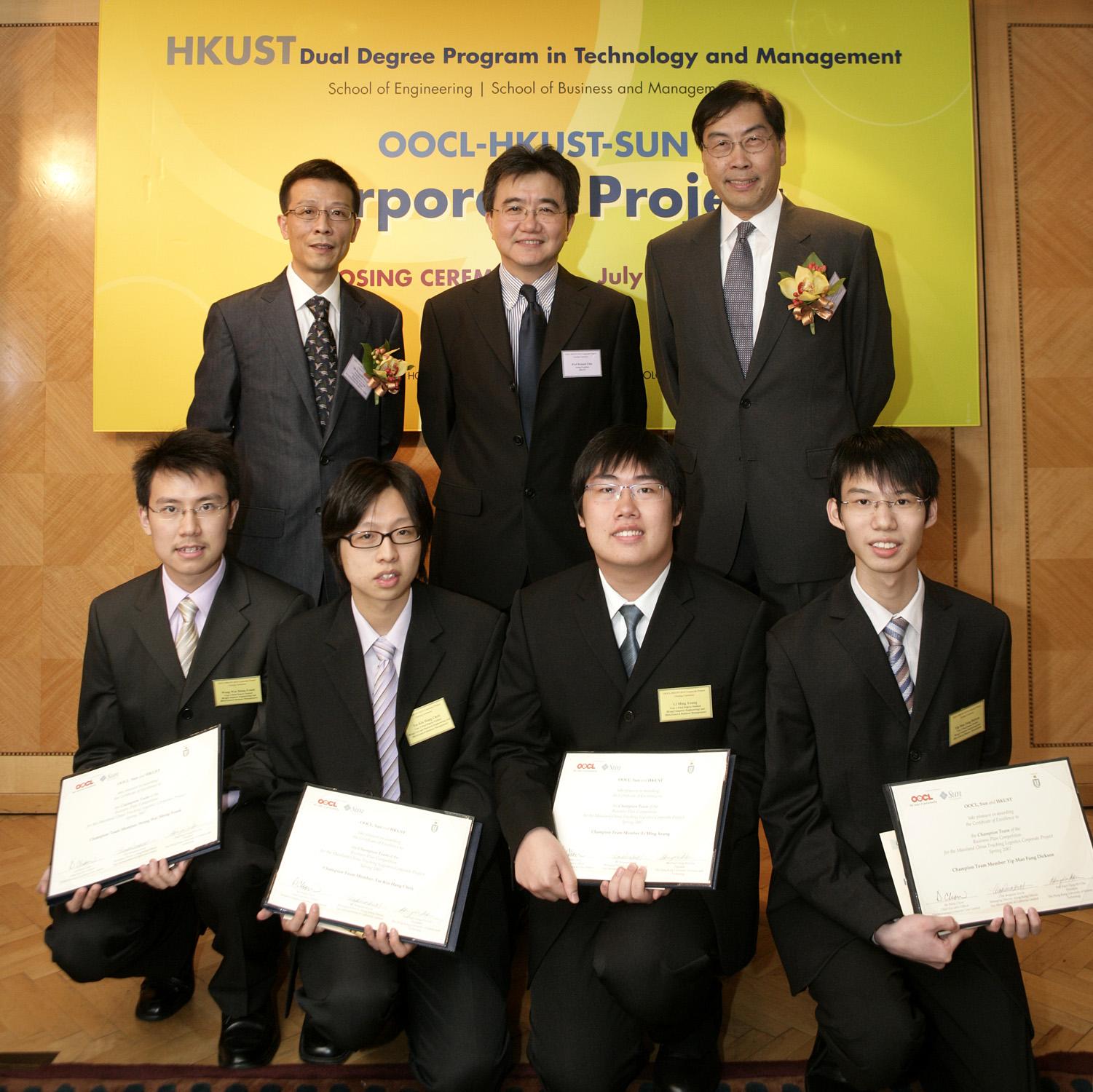 Prof Roland Chin (middle), Mr Philip Chow (right) and Mr Benjamin Kwok took a group photo with champion team