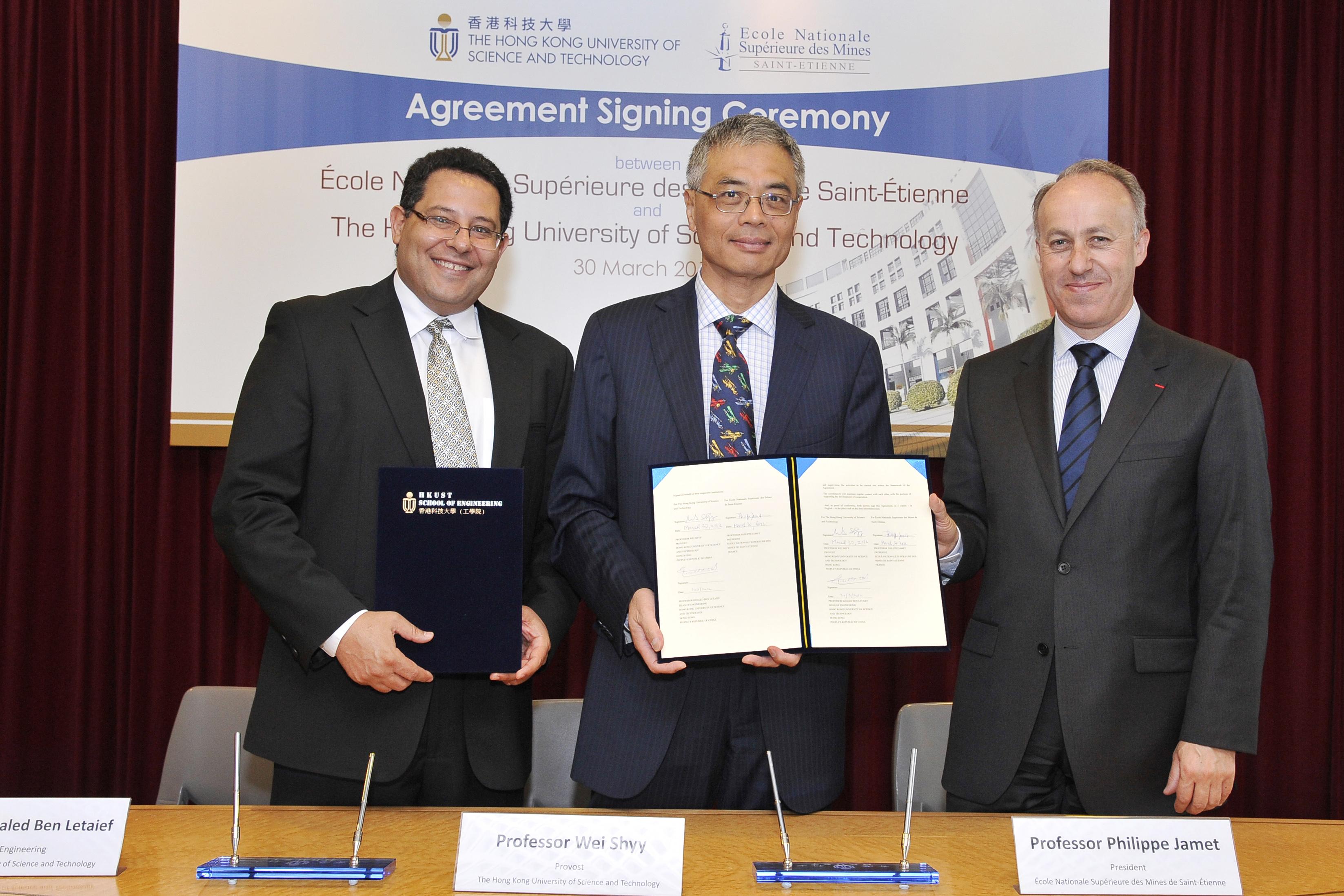  HKUST Provost Prof Wei Shyy (center), HKUST Dean of Engineering Prof Khaled Ben Letaief (left) and ENSMSE President Prof Philippe Jamet sign the memorandum and agreement