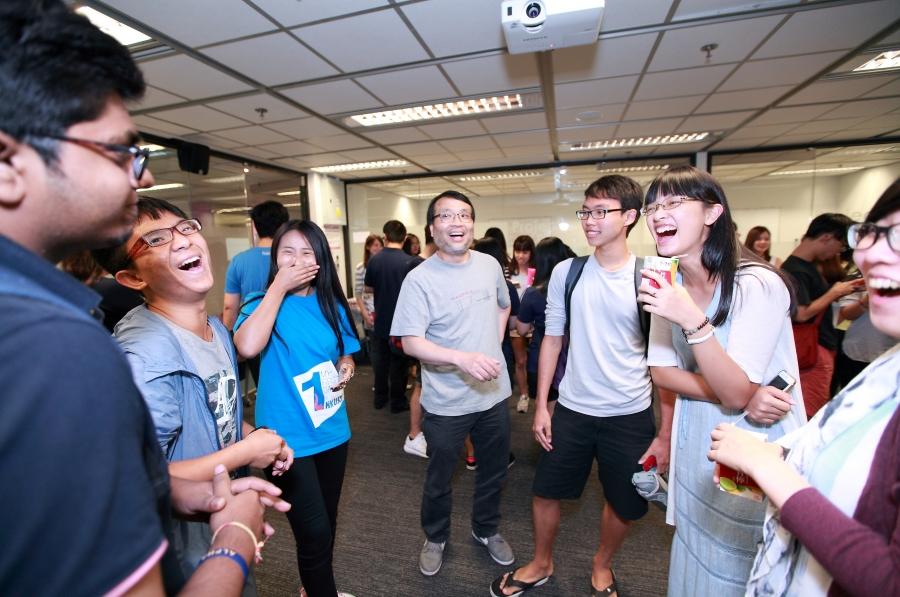 Prof. King L. CHOW (mid), Director of IPO, chats with students