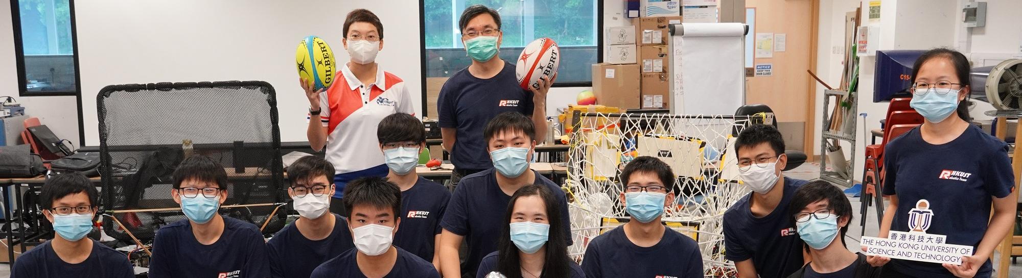 (Back row, from right) Prof. Tim Woo, Director of the Center for Global & Community Engagement, and Associate Professor of Engineering Education; and Dr. Crystal Fok, Chairperson of Robocon 2020 Hong Kong Contest Organizing Committee, and Director of AIR Platform and Precision Engineering, Hong Kong Science and Technology Parks Corporation, together with the leaders (front row, from right) Yiu Cheuk-Tung and Lam Cheuk-Hei as well as members of the HKUST Robocon Team