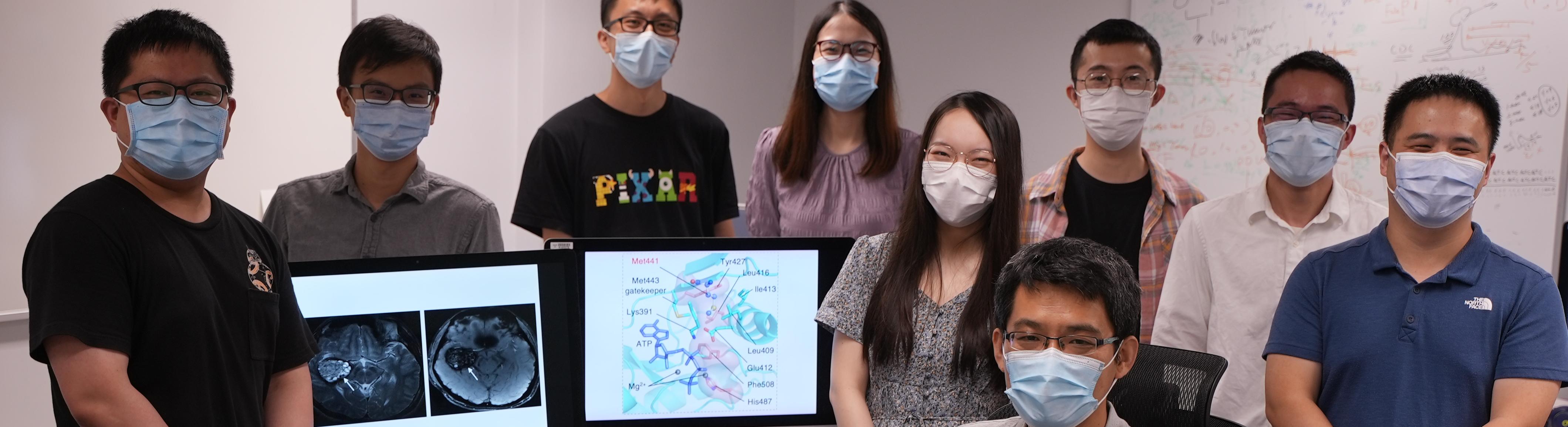 Prof. WANG Jiguang (front, seated) and his research team.