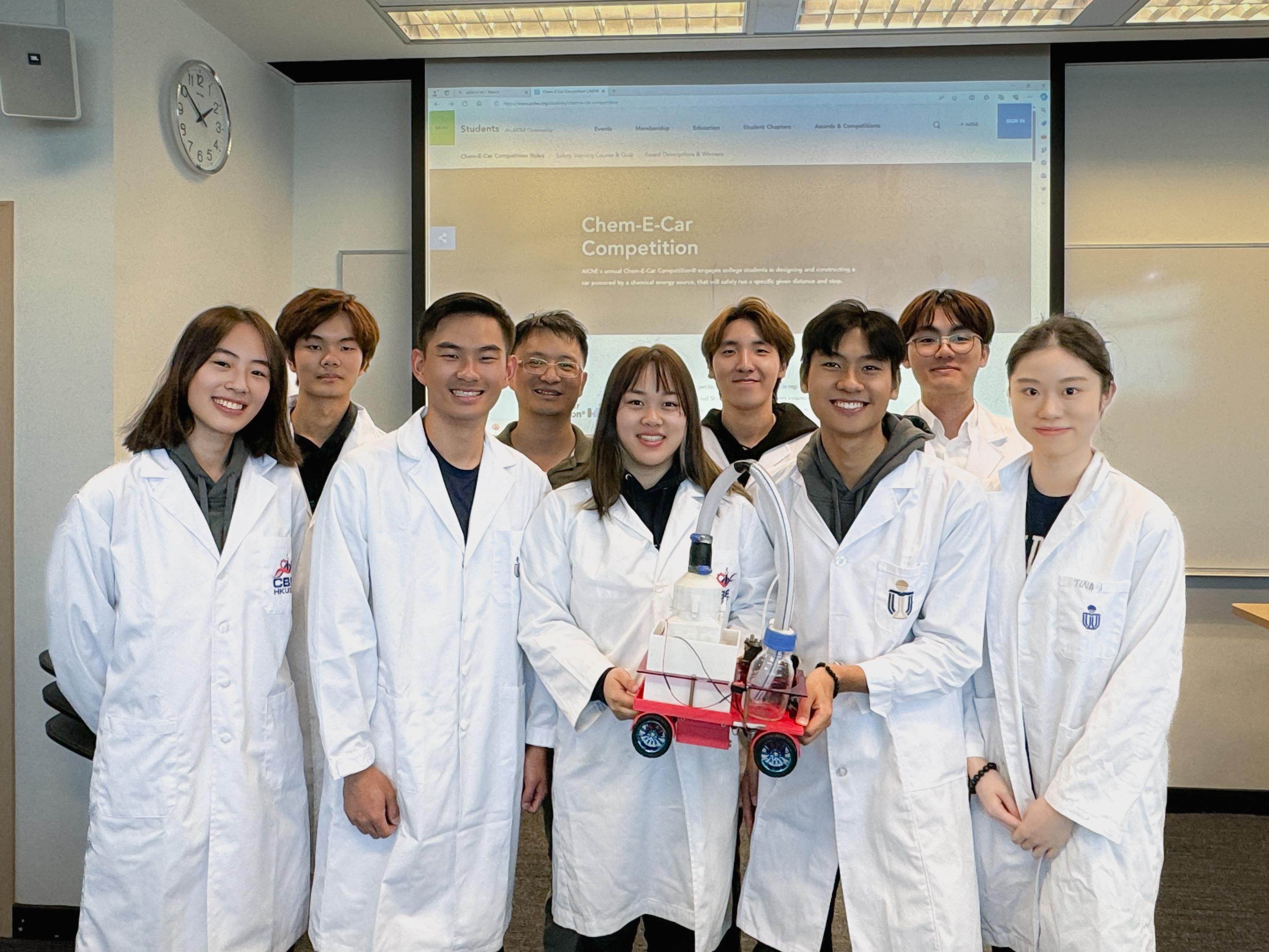 The HKUST Chem-E-Car Team “Chemical Turkey” with their supervisor Prof. Luo Zhengtang. (From left: Chloe Hui Ka-Ching, Timothy So Kwok-To, Eagle Tsang Cheuk-Yin, Prof. Luo Zhengtang, Jacqualine Ip Chi-In, Eric Yang Jeonghyun, Aaron Wong Hoi-Chung, Gordon Chan King-Him, and Tina Leung Ching-Ting)