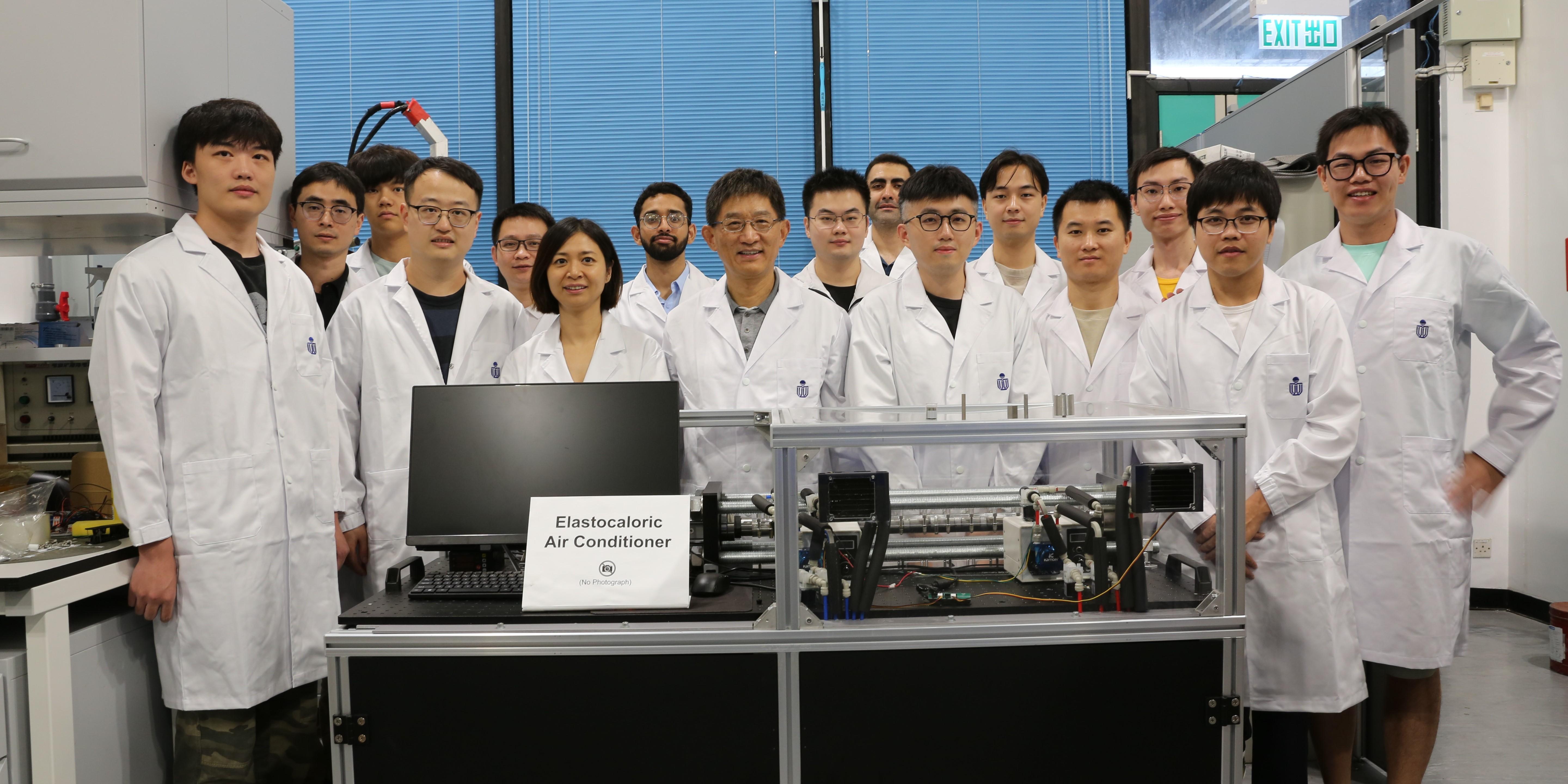 Prof. Sun Qingping (front row, fourth left), Prof. Yao Shuhuai (front row, third left), both Professors of Department of Mechanical and Aerospace Engineering (MAE), MAE Postdoctoral Research Associate Dr. Zhou Guoan (front row, second left), MAE PhD student Li Zexi (front row, first left), and other members of the research team with their elastocaloric air conditioner. 