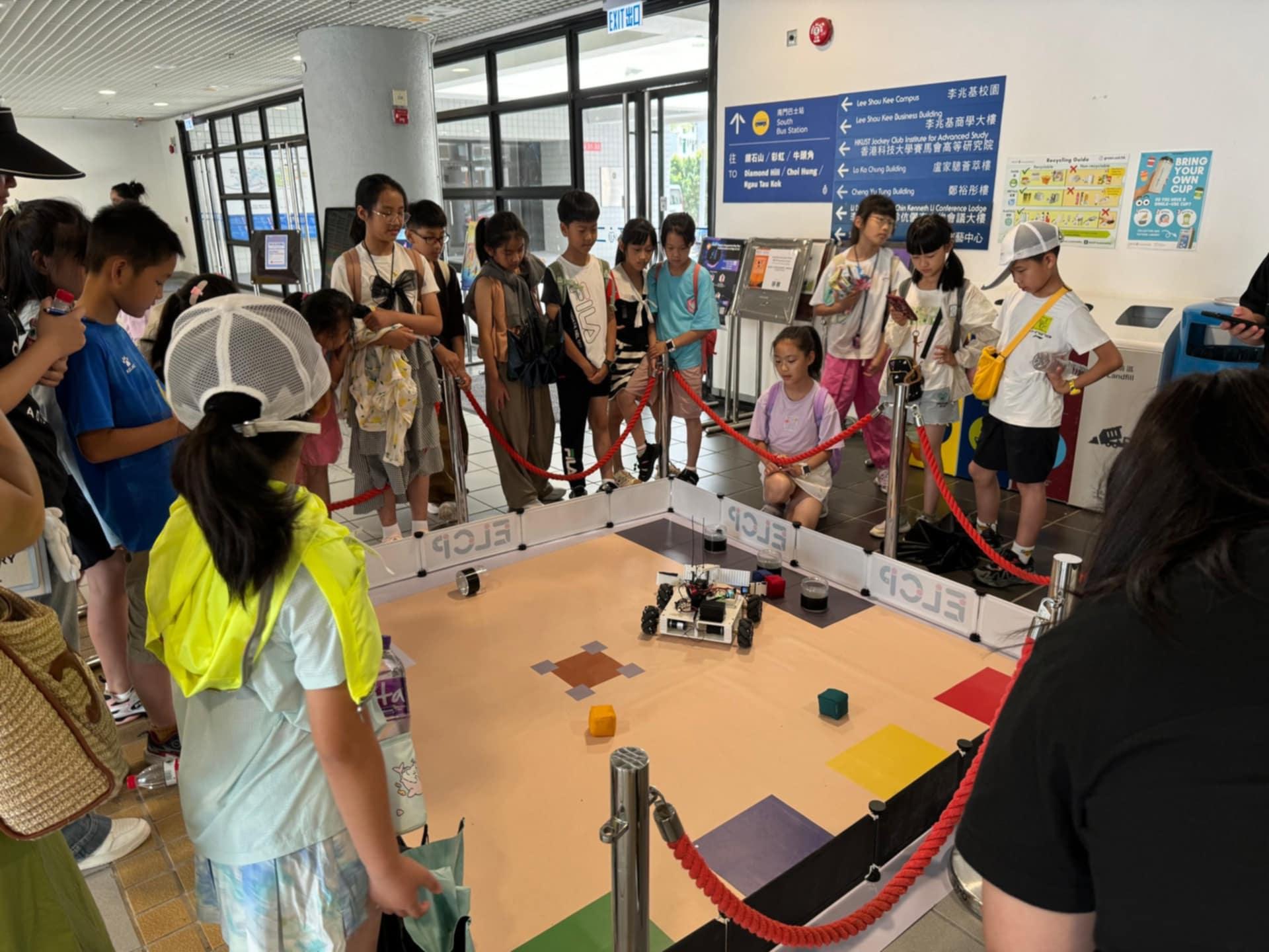 Children had fun controlling the robot designed for The Robot Explorer Cup, one of the major competitions hosted by GCE.